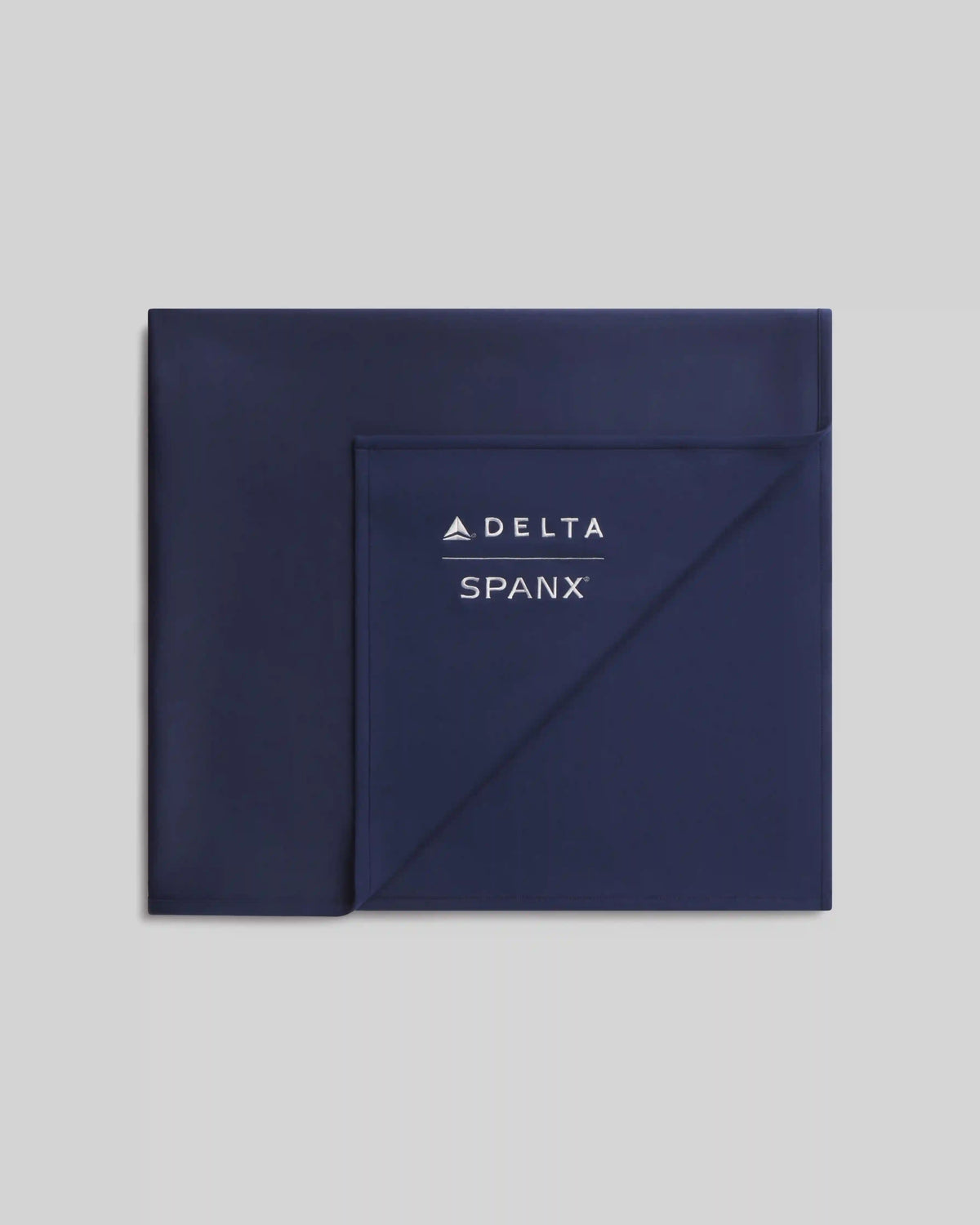 Delta x SPANX AirEssentials® Blanket | Timeless Navy